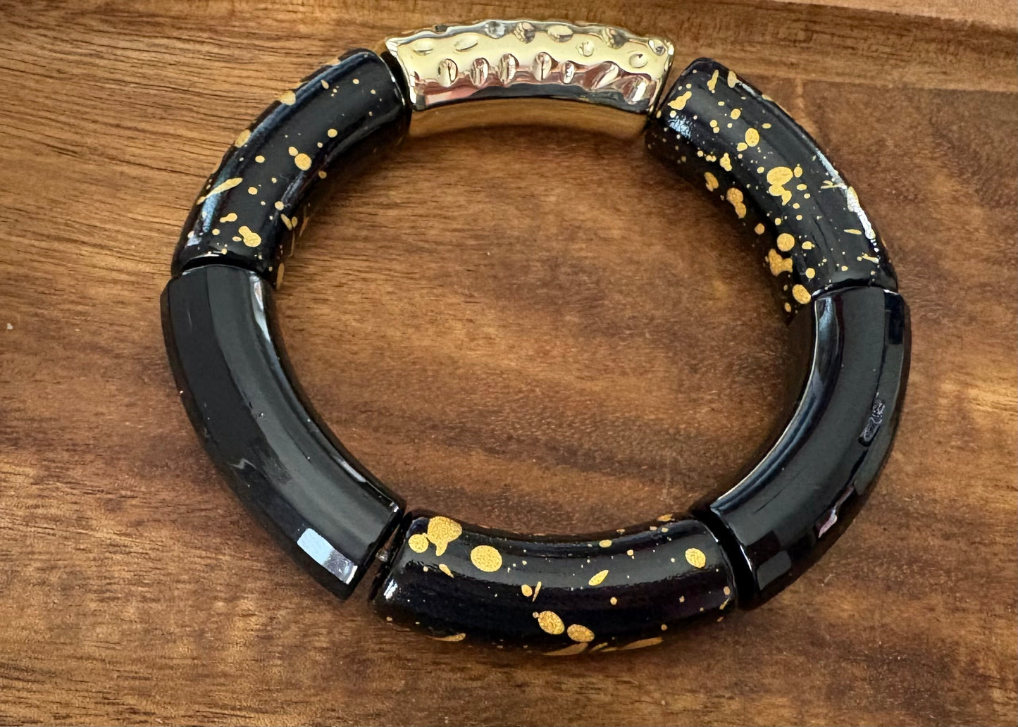 Bracelet tubulaire noir doré
