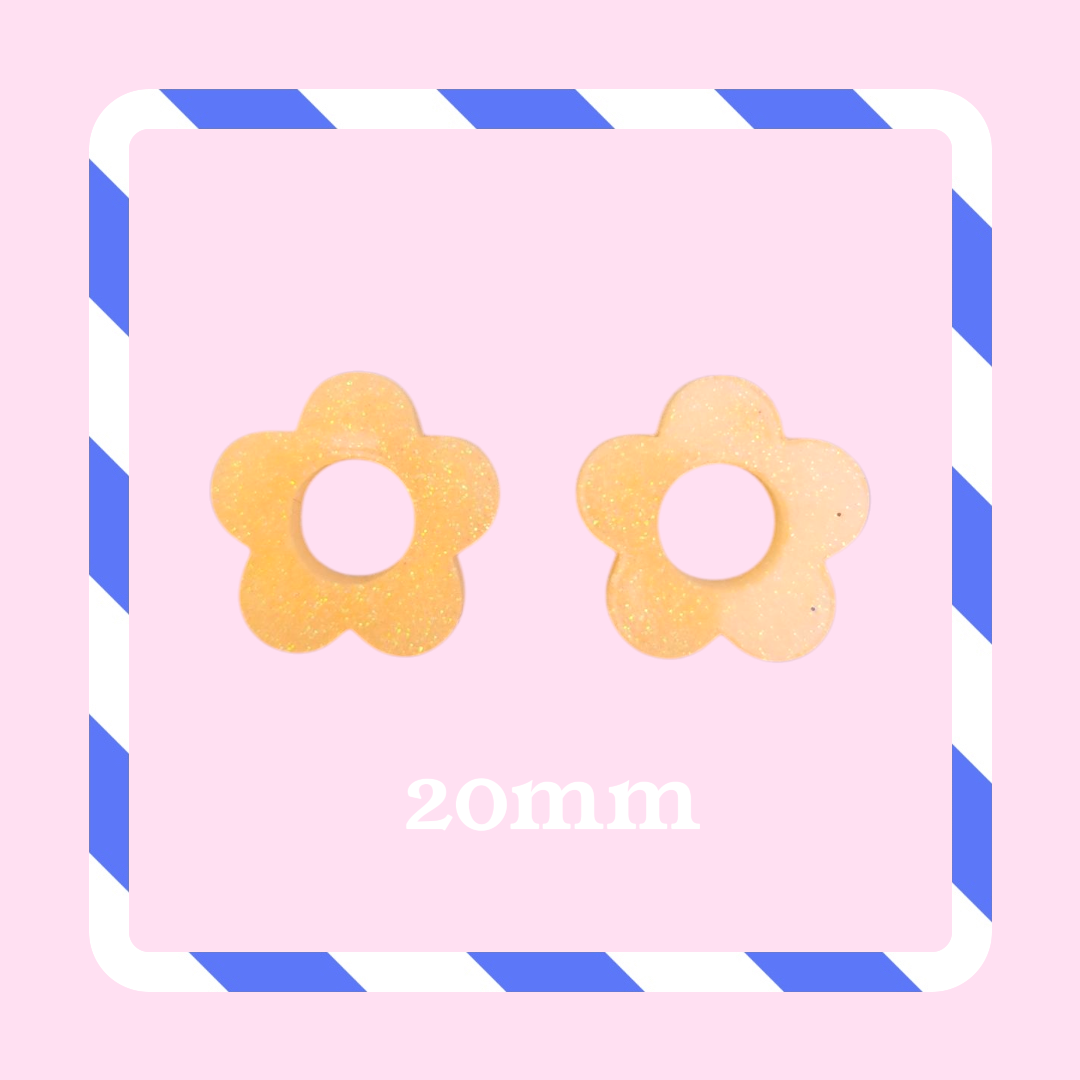 Charms fleurs pailletées orange pastel
