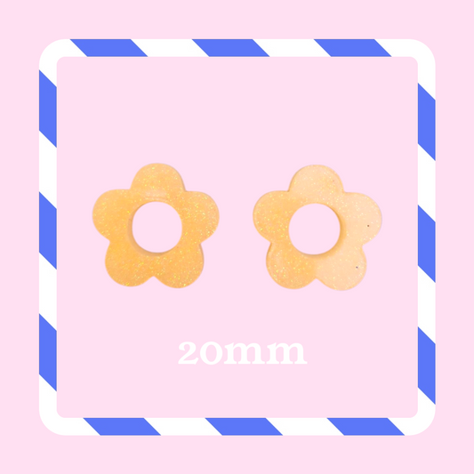 Charms fleurs pailletées orange pastel