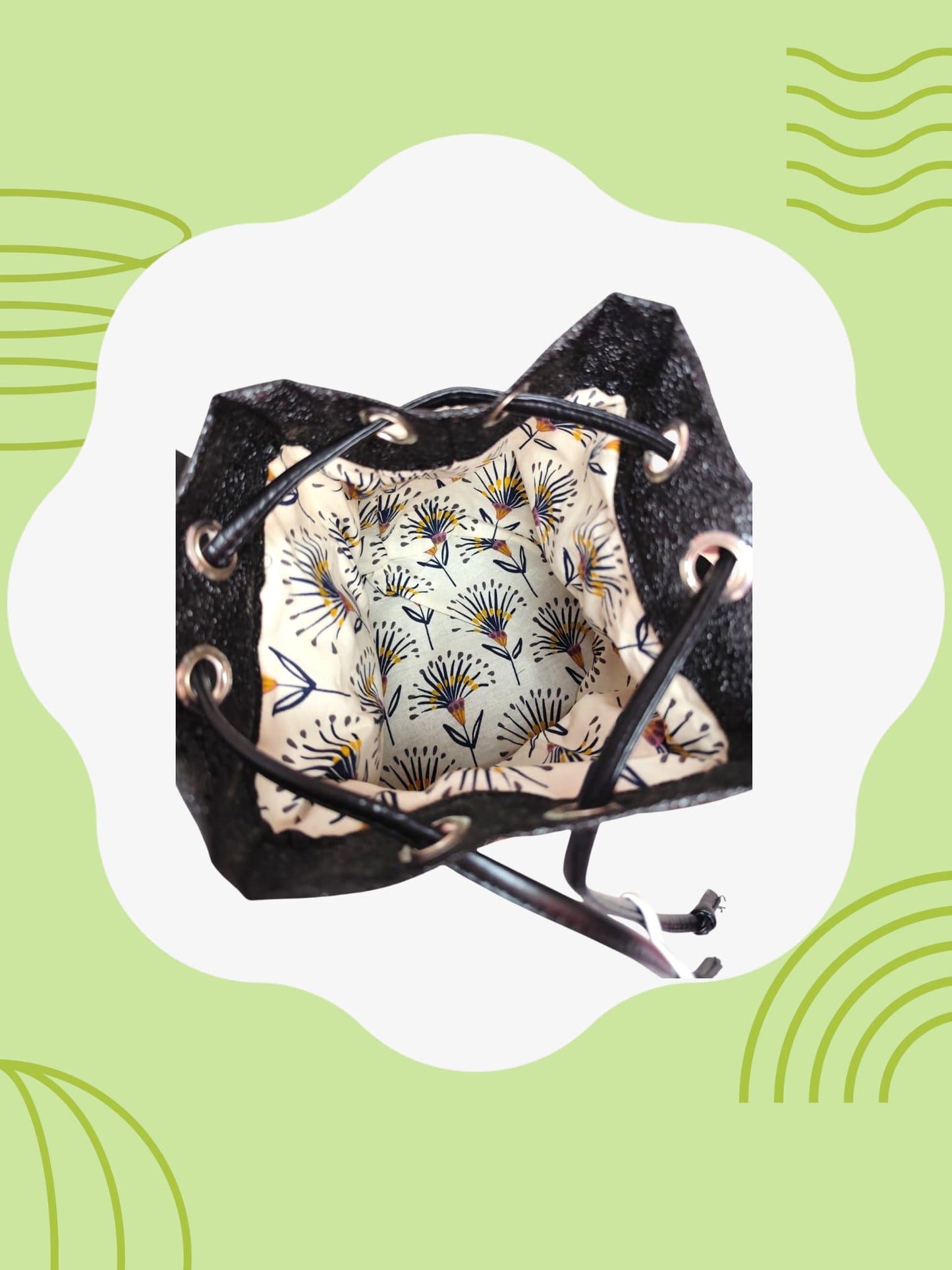 Sac seau tissu feuille noir fond terracotta cuir vegan noir