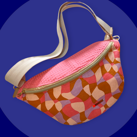 Sac banane motif géométrique capot nid d'abeilles rose corail