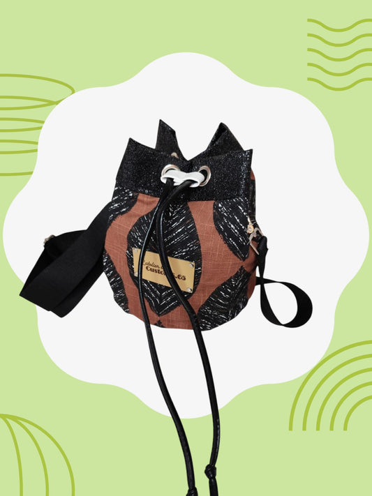 Sac seau tissu feuille noir fond terracotta cuir vegan noir