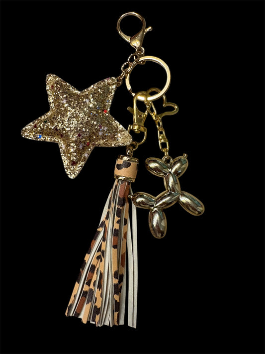 Bijou de sac léopart doré